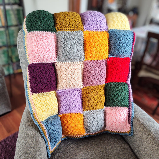 Soft Squares - Gefütterter Überwurf
2