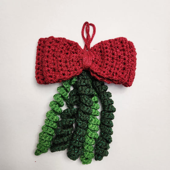 Glitzernde Weihnachtsfliege
3