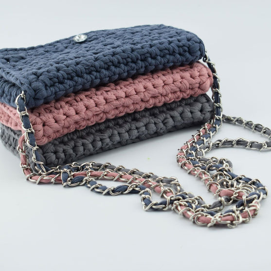 Ribbon Clutch-Handtasche
3