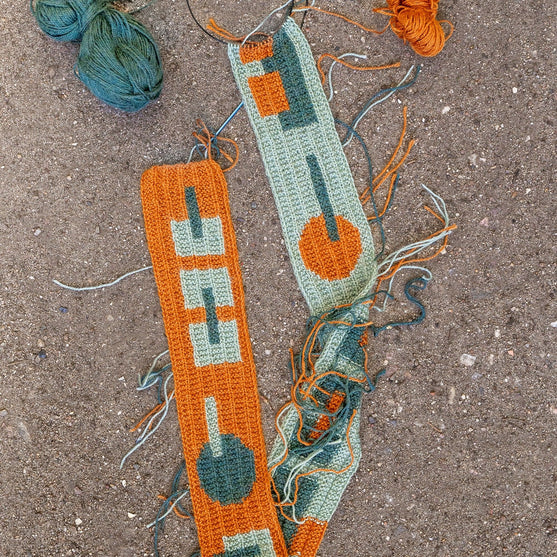 Rust & Rhythm - Kapuzenschal
5