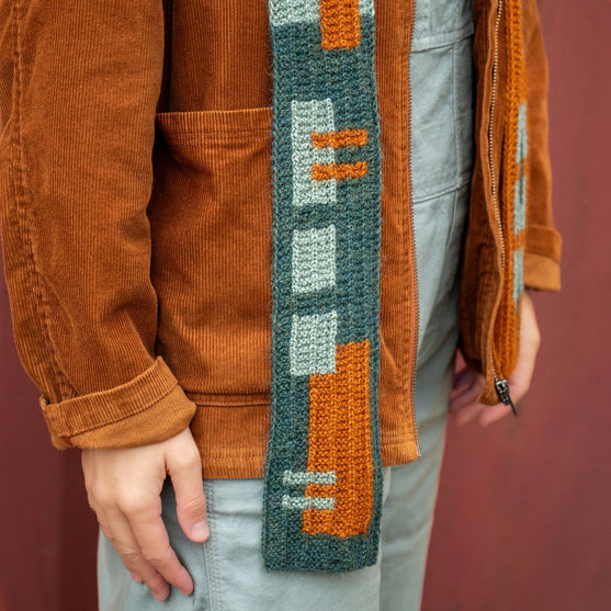 Rust & Rhythm - Kapuzenschal
4