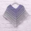 

Classical Attitude Poncho - Kinder
4