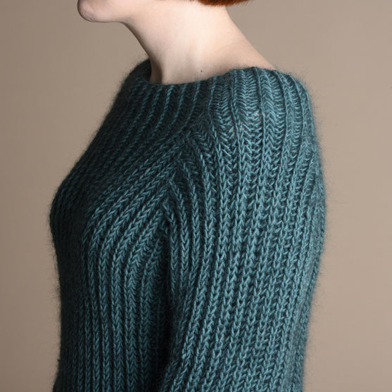 

Naya - Patent Sweater
2