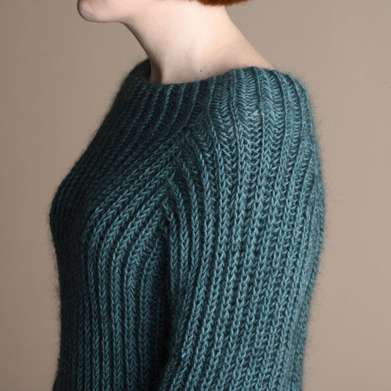 

Naya - Patent Sweater
2