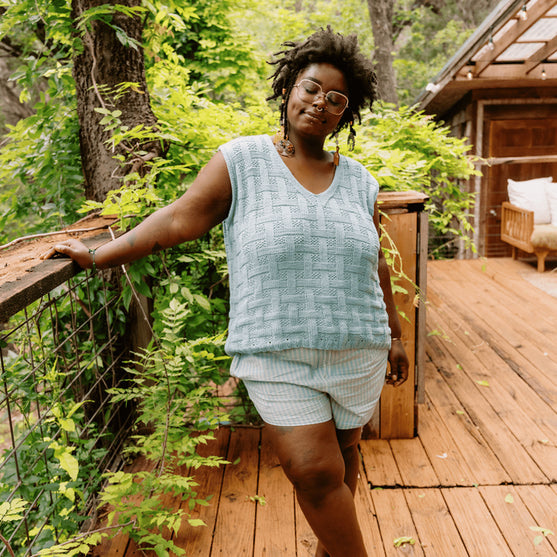 

Calme Top - Ärmelloses Top im Korbmuster
1