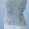 

Cloudbusting - Cardigan mit Zopfmuster
4