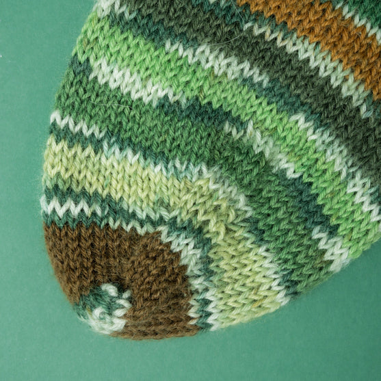 

Frigg - Kurze Socke mit Rüsche
4