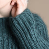 

Naya - Patent Sweater
3