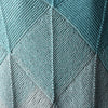 

Emerald - Domino Schal
4