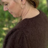 

Kastanje - Cardigan
5
