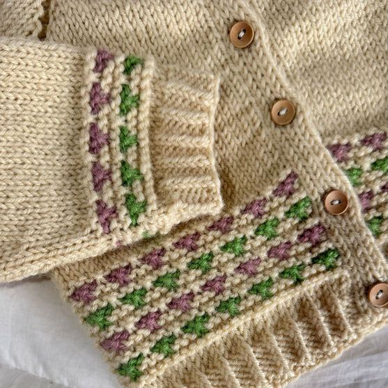 

Romi - Kinder-Cardigan
5