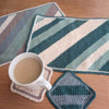 

Crossed - Platzdeckchen und Untersetzer Set
1